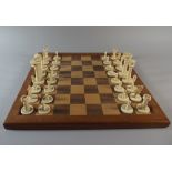 A Late 19th / Early 20th Century Ivory Chess Set (Complete) with Later 20th Century Chess Board, 40.