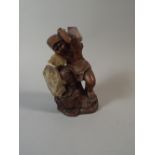 A 19th Century Black Forest Terracotta Gnome Figure with Assorted Stones and Crystals.