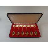 A Cased Set of Six Gilded Teaspoons with Sporting Animal Finials to Include Pheasant, Stag, Salmon,