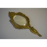 A French Ormolu Hand Mirror with Bevelled Oval Glass. 30cm Long.