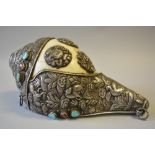 An Antique Tibetan Manjushri Silver Mounted Conch Shell having Embossed Decoration with Animals,