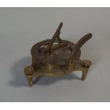 A Reproduction Brass Sundial/Compass Inscribed with Pseudo Mark for F.L. West.