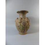 An Unglazed Stoneware Vase Decorated in Relief with Frogs,