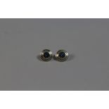 A Pair of Silver Mounted Circular Aquamarine Stud Earrings