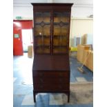 An Edwardian Mahogany Bureau Bookcase with Three Drawers to Base.