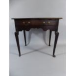 A 19th Century Oak Side Table with Single Drawer on Cabriole Legs.