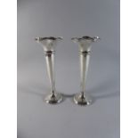 A Pair of Silver Trumpet Vases on Turned Bases. 27.5cms High (Filled) Walker and Hall, Sheffield.