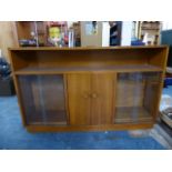 A Vintage Mahogany SIde Unit with Centre Cupboard Flanked by Two Shelved Glazed Displays and Open