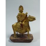 A 19th Century Chinese Carved and Gilded Figure of a Musician Seated on Horseback.