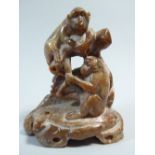 A 19th Century Chinese Carved Soapstone Figure Group of Two Grooming Monkeys.