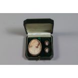 A 9ct Gold Cameo Brooch together with a Pair of Cameo Earrings.