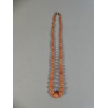 A Vintage String of Graduated Red Coral Beads