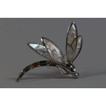 A Large Ladies Silver Brooch in the Form of a Dragonfly set with Mother of Pearl and Stamped 925.