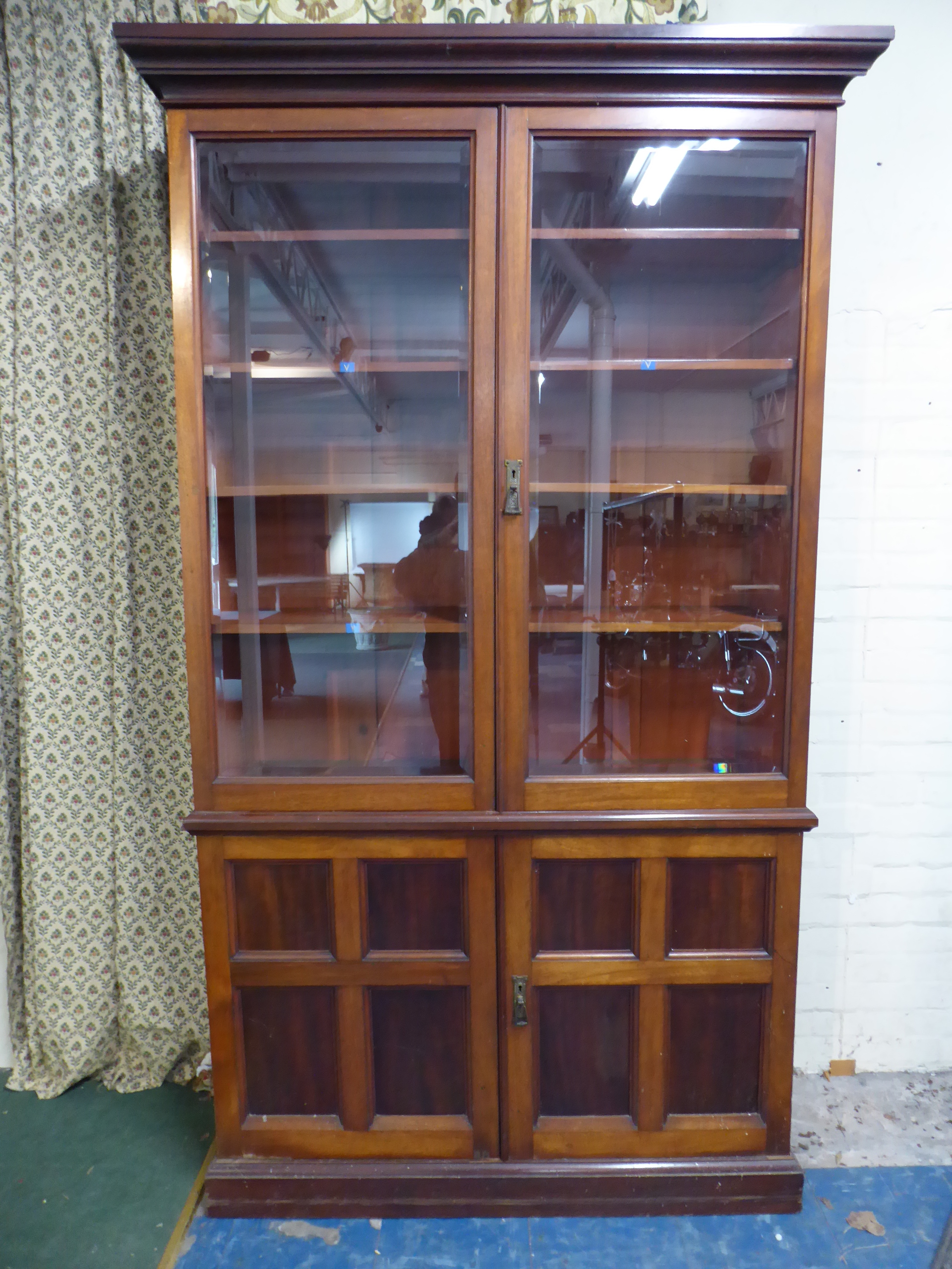 An Edwardian Library Bookcase with Panelled Doors to Cupboard Base and Glazed Top Section with Four