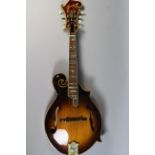 An Ibanez F Style Mandolin with Rosewood Fingerboard and Mother of Pear Inlay.
