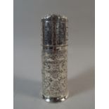 A Silver Cylindrical Sugar Sifter with Embossed Decoration, Chester 1899. 17.