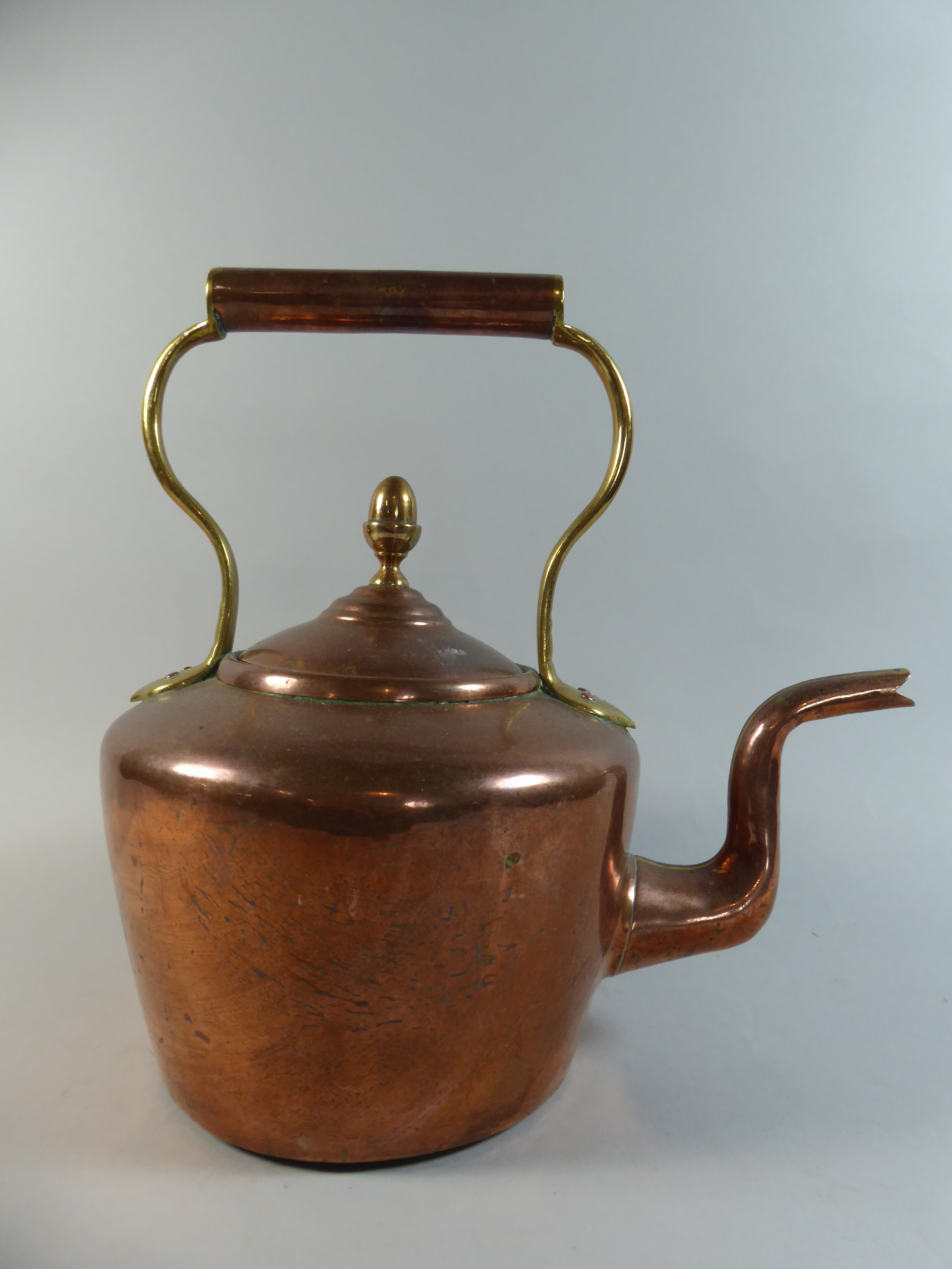 A Large Copper and Brass Kettle.