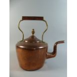 A Large Copper and Brass Kettle.