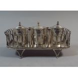 An Interesting 19th Century Continental Rectangular Silver Three Bottle Inkstand with Four Quill