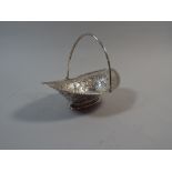 A Georgian Silver Oval Sugar Basket, London Hallmark but Badly Rubbed. Embossed Decoration. 122gms.