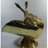 An Impressive Brass and Walnut Helmet Shaped Coal Scuttle.