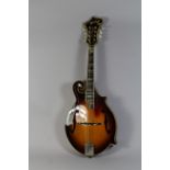 An Ibanez F Style Mandolin. Mother of Pearl Inlay to Ebony Fingerboard.