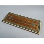 A 19th Century Anglo-Indian Sandalwood Cribbage Board with Bone and Sadeli Mosaic Banding.