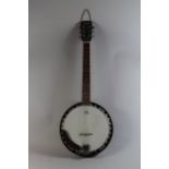 A 20th Century Ozark Guitar Banjo.