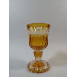 A Bohemian Overlaid Edwardian Amber Glass Vase with Cut Decoration and Cartouches Etched with