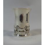 A Heavy Scottish Silver Beaker Decorated with Cantering Horses in Relief.