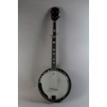 An Ozark Five String Resonator Banjo. Chrome Hardware and Ebony Fretboard.