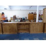 A Contemporary Pine Kitchen Side Unit with Centre Bookcase Flanked by Side Units,