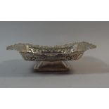 A Rectangular Silver Bowl with Embossed Decoration and Pierced Border. On Rectangular Foot.