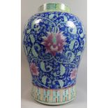 A Good Chinese Vase Decorated with Foliage and Pink Flowers on Blue Ground.