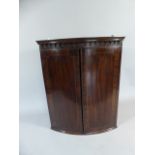 A 19th Century String Inlaid Mahogany Bow Fronted Corner Cabinet with Shaped Two Shelf Interior
