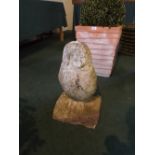 A Reconstituted Stone Owl Patio ornament,