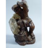 A 19th Century Black Forest Terracotta Gnome Figure with Assorted Stones and Crystals.