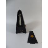 A Mayfair Metronome In Metal case