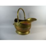 A Brass Shaped Helmet Coal Scuttle