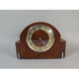 An Art Deco Walnut Mantle Clock