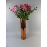 A Copper Cylindrical Stick Stand with Artificial Flowers,