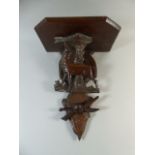 A Carved Oak Black Forest Wall Bracket Decorated with Deer Grazing at Tree,