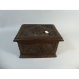 A 19th Century Carved Oak Box with Hinged Lid,