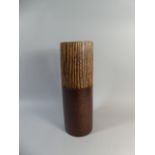 A Turned Cylindrical Wooden Vase,