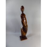 A Carved Wooden Modern Art Study of a Standing Female,