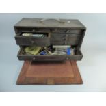 An Edwardian Engineers Tool Cabinet Containing Various Tools and Fittings Having Eight Graduated