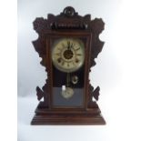 An American Gingerbread Mantle Clock with Eight Day Movement Chiming on Gong and Bell,