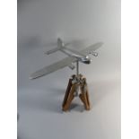 A Paragon Aluminium Model of an Aircraft Set on Tripod Support,