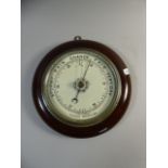 An Edwardian Circular Aneroid Barometer in Mahogany Frame,