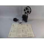 A Vintage Pathescope ACE Projector with Reel Film and Original Instruction Leaflet